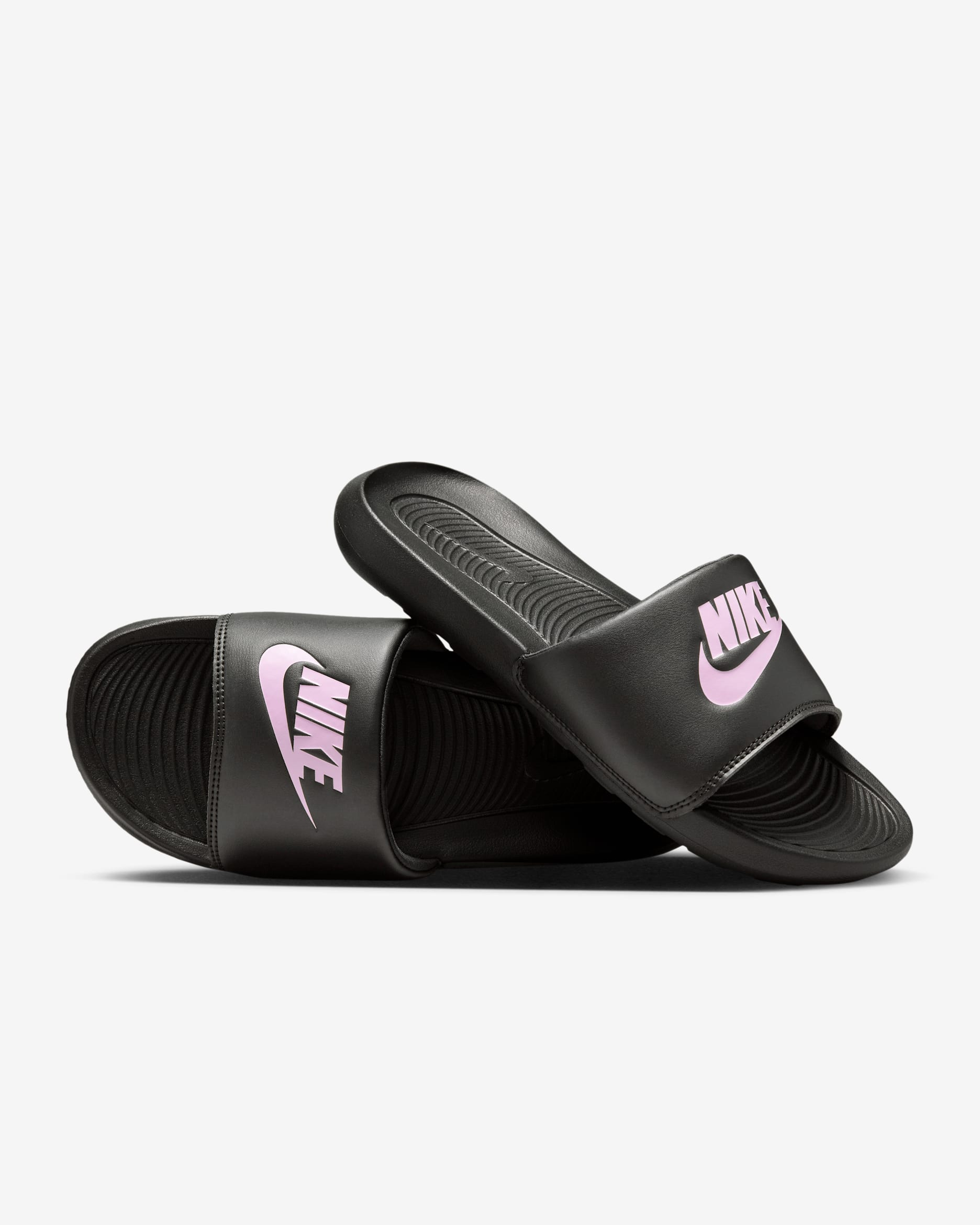 (取寄) ナイキ レディース ビクトリー ワン スライド Nike women Victori One Slides Black/Light Arctic Pink/Black Nike Victori One Women's Slides. Nike.com